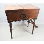 A 19th century walnut veneered and rosewood work box, with fitted interior, and pierced decorative