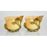 A pair of Royal Worcester Japanesque vases, modelled with lily, frog and turtle. 11cms