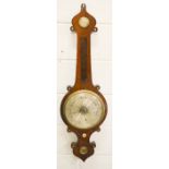 A 19th century wheel barometer. 104cms