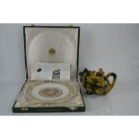 A Spode Marine Corps 200yrs commemorative plate together with a Carlton ware airplane teapot
