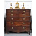 A 19th century mahogany chest of drawers, with two short over four long graduated drawers, raised on