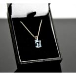 An 18ct white gold and aquamarine pendant, the aquamarine approximately 1ct, 2.9g.