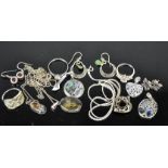A group of silver jewellery, to include two mother of pearl pendants, three rings, two heart form