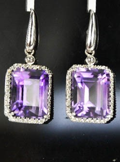 An 18ct white gold, diamond and amethyst drop earrings, the cushion cut amethysts bordered by - Image 5 of 7