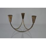 A 1950s sterling silver candleabra by Duchin, of mid-century design, weighted, 15cm high, 12.73toz