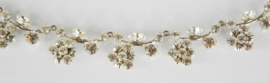 A 1930s paste / diamante necklace, composed of flowerheads, 41cm long. - Image 2 of 2