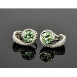 An 18ct green tourmaline and diamond pair of earrings, 10g.