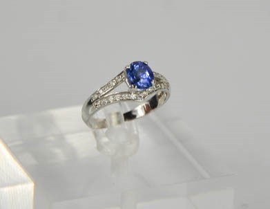 A 14ct white gold, sapphire and diamond ring, the sapphire approximately 1ct, the diamonds totalling - Image 4 of 7