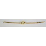 A 9ct gold ladies Tudor Royal wristwatch, and strap, with crown baton, 11g.