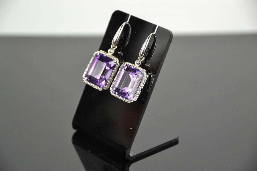 An 18ct white gold, diamond and amethyst drop earrings, the cushion cut amethysts bordered by - Image 4 of 7