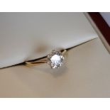 An 18ct yellow gold, and diamond solitaire ring, the diamond approximately 1.2ct, size P.