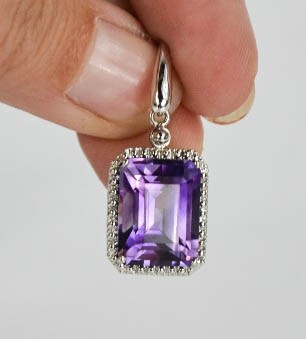 An 18ct white gold, diamond and amethyst drop earrings, the cushion cut amethysts bordered by - Image 7 of 7