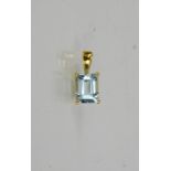 A 9ct yellow gold and aquamarine pendant, set with 1.5ct emerald cut aquamarine.