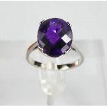 A 9ct white gold and amethyst cocktail ring, size O, 4.1g.
