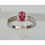 An 18ct white gold, diamond and pink spinel ring, the diamonds totalling 0.25ct approximately, the
