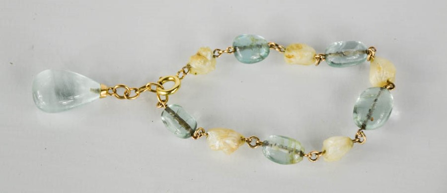 A 14ct gold, crystal and pearl bracelet, the polished pale blue crystal beads interspersed with - Image 2 of 2