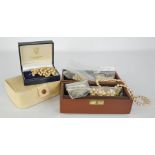 A cultured pearl 1920s double strung bracelet, together with boxes containing loose simulated and