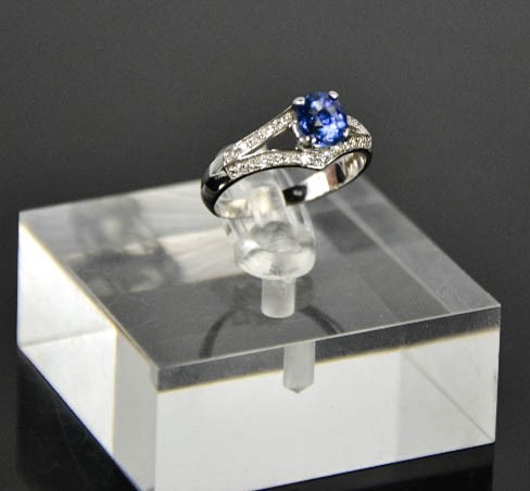 A 14ct white gold, sapphire and diamond ring, the sapphire approximately 1ct, the diamonds totalling - Image 6 of 7