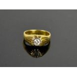 An 18ct yellow gold and diamond ring, the diamond approximately 0.40ct, size P½, 7.9g.