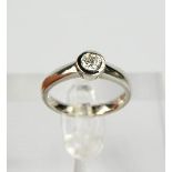 A platinum and diamond solitaire ring, the diamond approximately 0.35ct, size L½, 6.2g.
