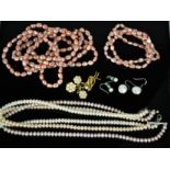 Two pairs of pearl earrings, a triple string pearl necklace of graduated colour, a pink freshwater