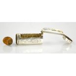 A Dutch silver nutmeg grater, engraved A.G Smit-Smit, engraved with chased decoration, 1.14toz.