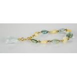 A 14ct gold, crystal and pearl bracelet, the polished pale blue crystal beads interspersed with