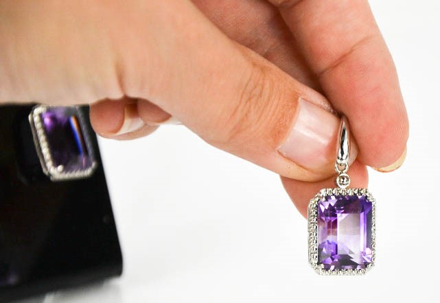 An 18ct white gold, diamond and amethyst drop earrings, the cushion cut amethysts bordered by - Image 6 of 7