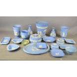 A quantity of blue Wedgwood Jasperware to include trinket box, vase, dishes etc