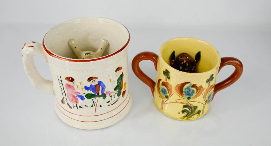 A late 19th century Staffordshire frog mug, and an example by Lauder Barum.