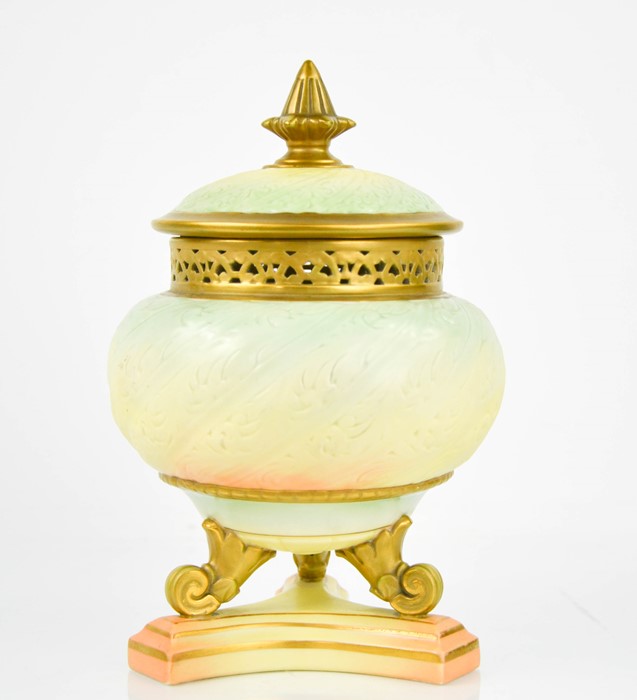 A Royal Worcester pot pouri jar and cover, with gilded decoration, 24cm high.