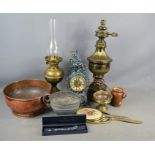 A brass oil lamp, copper pot, silver bracelet , mantle clock and other items