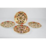 A set of four Royal Crown Derby plates, in the Imari pattern, numbered 1128, 17cm diameter.