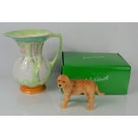 A John Beswick hand painted dog figure 10.5cm together with a Beswick ware jug 19cm