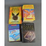 A group of Harry Potter books to include Harry Potter and the half blood prince with page 99