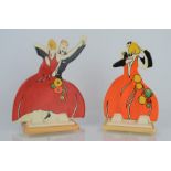 A pair of Wedgwood Clarice Cliff "Bizarre" Jazz dancers