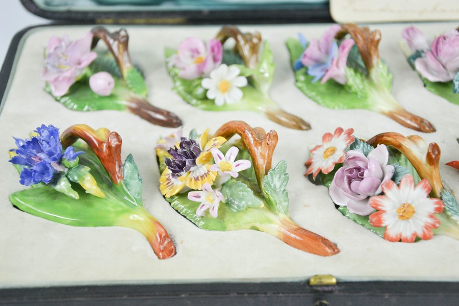 A fine set of Dresden floral table menu holders, modelled as different flowers, in the original - Image 4 of 7