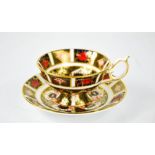 A Royal Crown Derby cup and saucer in the Imari pattern no 1128.