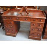 A Victorian mahogany desk, with banks drawers to each pedestal, the drawer stamped with makers