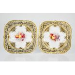 A pair of Royal Worcester plates painted with fruit, signed E.Townsend. A/F