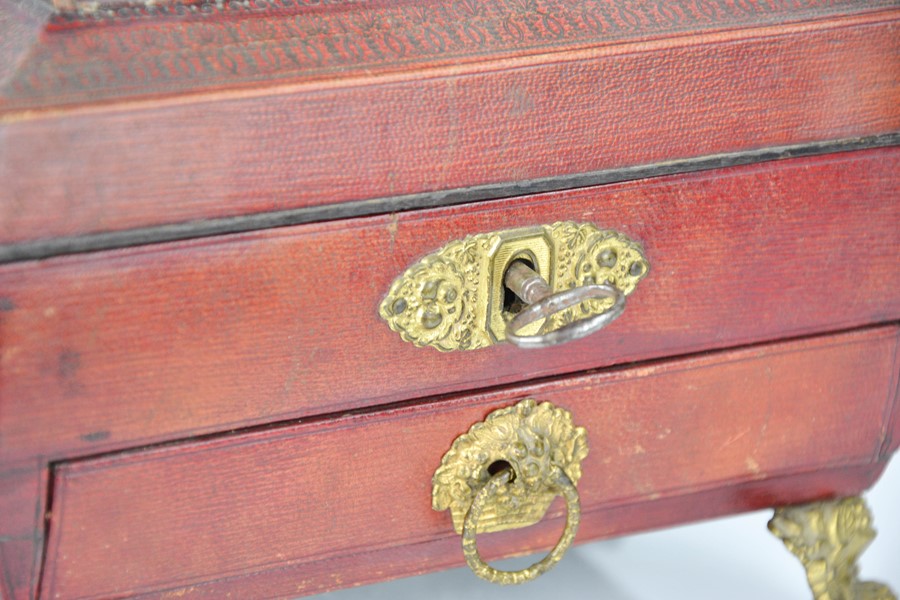 A Regency work box clad in red leather, with fitted interior containing sewing accessories, above - Image 4 of 7