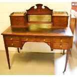 A 19th century ladies writing desk, in mahogany, inlaid with satinwood decoration, and the drawer