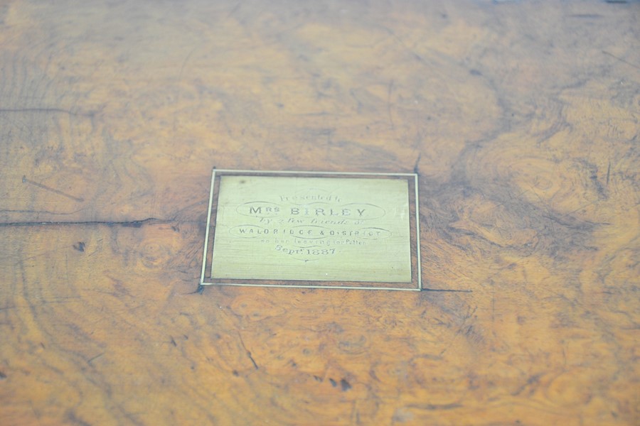 A 19th century burr walnut brass inlaid writing slope.