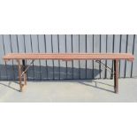 A wooden folding bench/ work platform