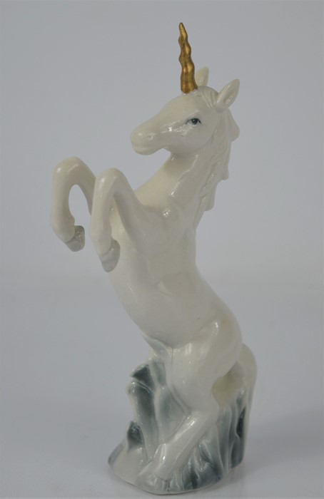 A porcelain figurine of a unicorn - 16cm