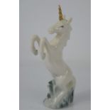 A porcelain figurine of a unicorn - 16cm