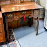 An 18th century oak lowboy with three drawers, and shaped apron, 71 by 81 by 46cm.