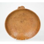 A Robert Thompson 'Mouseman' oak circular bowl, with the carved trademark mouse to the edge, circa