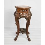 A 19th century Chinese hardwood jardinere stand, with marble top.