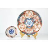 An Imari Chinese charger, together with a small 19th century Chinese dish depicting birds.